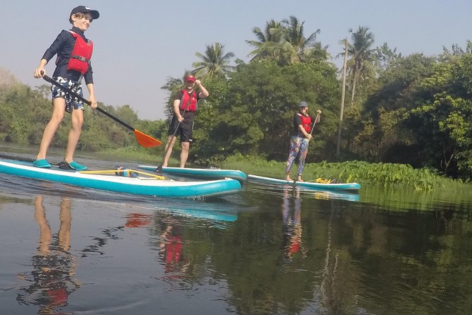 1.5 - 2 hour afternoon SUP class for all ages and levels - The payoff: paddling along the River Kwai