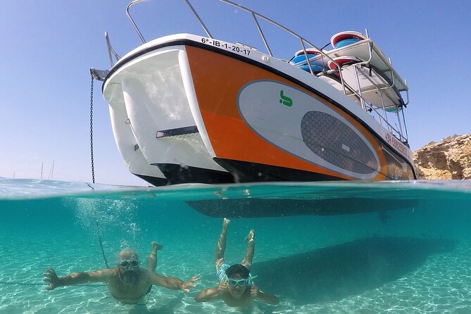 3 Hours by Boat with Paddle Surf Course, Snorkel and more - From Club Náutico San Antonio to Ibiza’s West-Coast Coves