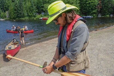 6 Hour Algonquin Park Canoe Trip - The paddling rhythm: Canoe Lake, reflections, and that totem stop