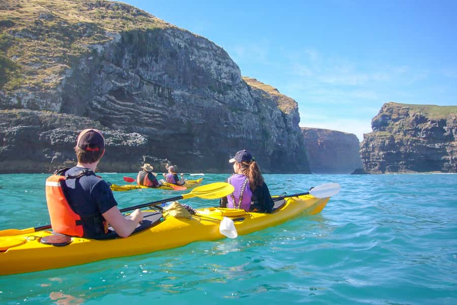 Akaroa: 4WD Safari and Guided Sea-Kayaking Experience - Gear-up moment: double kayaks, dry gear, and a quick safety reality check