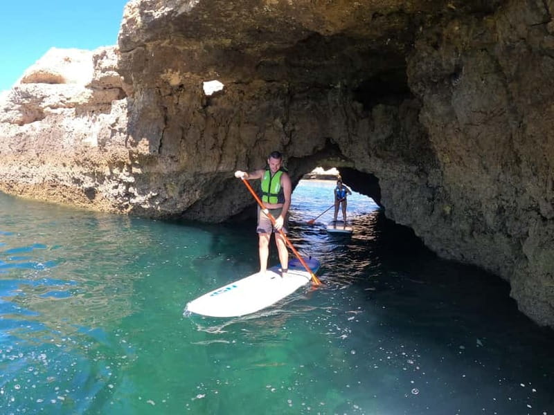 Albufeira: Caves and cliffs Paddleboarding (SUP) Tour - Getting to Praia da Coelha: Where You Meet and Start Paddling