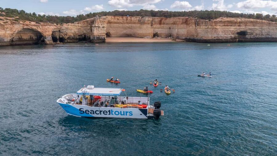 Albufeira Marina: Benagil Cave to Marinha Beach Kayak Tour - Approaching Benagil Cave: What You See Up Close (and the Rule)