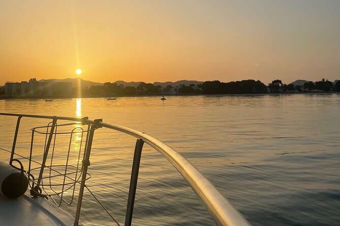Alcudia 3hr Sunset Trip with Drinks, Tapas, SUP & Snorkel - Two anchor moments: caves, cliffs, and the Alcanada lighthouse view