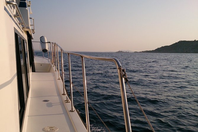 Alcudia 3hr Sunset Trip with Drinks, Tapas, SUP & Snorkel - Swim, snorkel, and SUP when the light turns gold