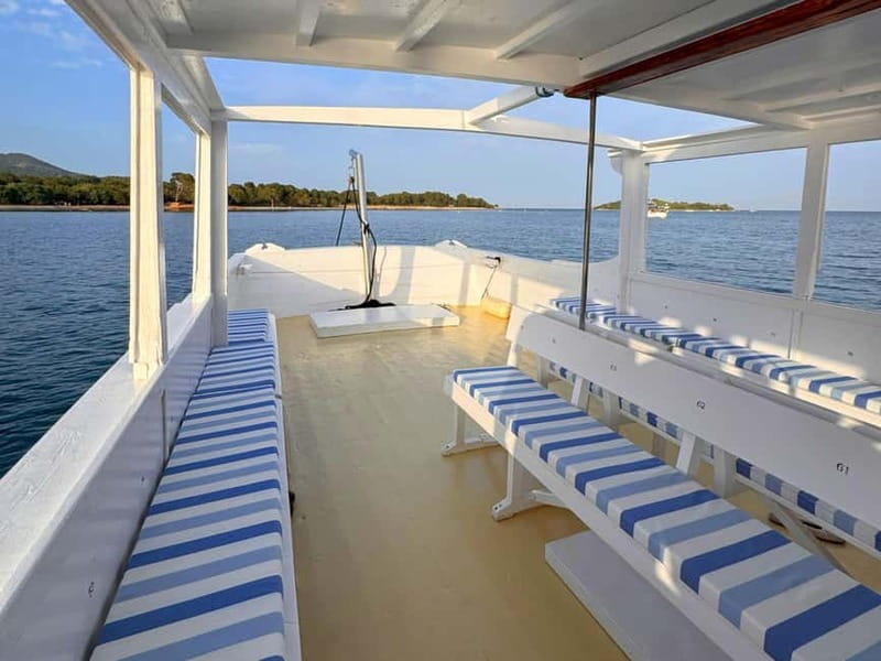 Alcudia Mallorca: Boat Trip with Food, Snorkeling, and SUP - The Experience Style: Relaxed Music, Local Crew, Real Sea Time