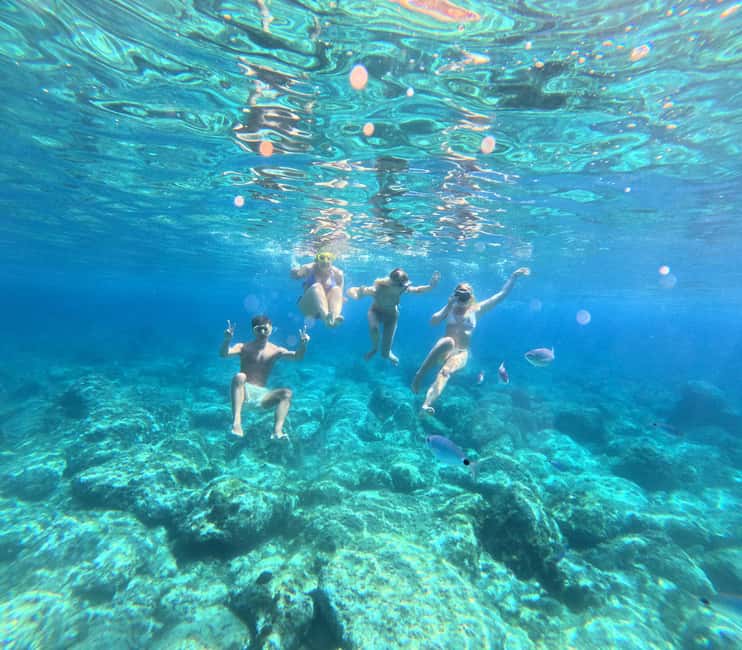 Alghero: boat tour, snorkelling, sup - What’s included: you’re paying for a full package, not just transport
