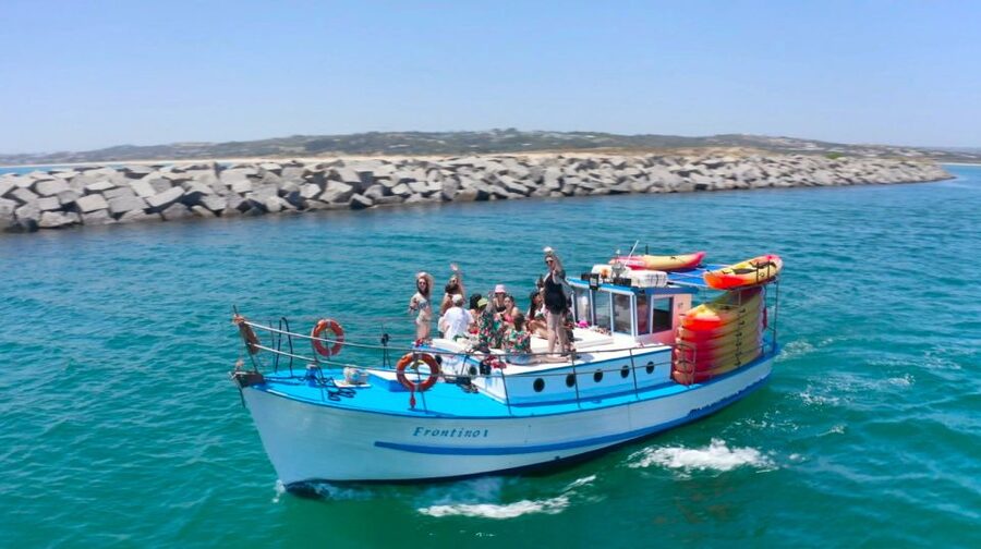 Alvor: Explore Caves Boat and Kayak Tour - Frontino Wooden Boat: Vintage Comfort Before You Paddle