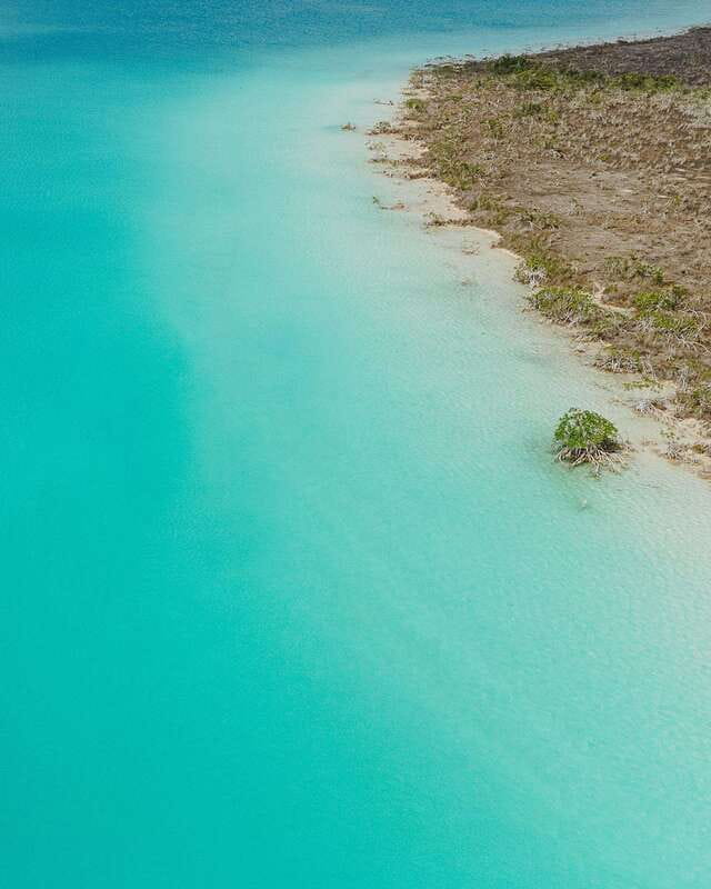 Bacalar Sunrise Stand Up Paddleboard Tour with Breakfast - Breakfast mid-lagoon: fruit, toast, and coffee in sunrise silence