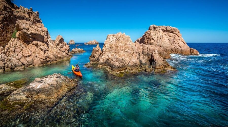 Barcelona: Costa Brava Kayak, Snorkel & Cliff Jump & Lunch - Cliff jumps in the real world: thrilling, but designed for safety