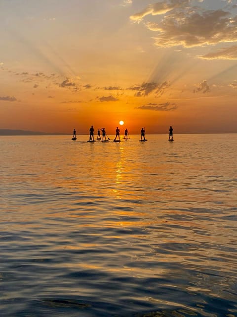 Barcelona: Sunrise Standup Paddle Tour w/ 4K Video & Coffee - Technique time: learning on a board while someone keeps an eye on you