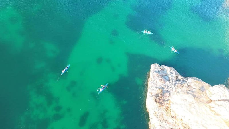 Benagil Kayak Tour: Explore Secret Caves with Licensed Guide - Stop-by-stop: from Praia da Marinha to Benagil Sea Cave