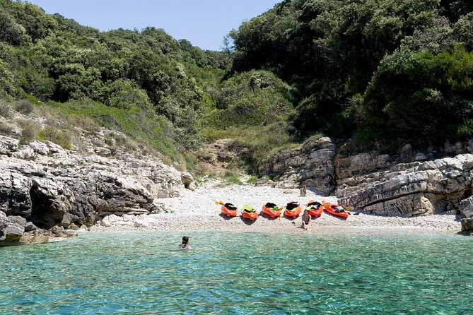 BOAT & KAYAK! Sea Adventure - Snorkeling & Cliff Jumps - The hidden beach break: swimming, snorkeling, and the cliff-jump moment