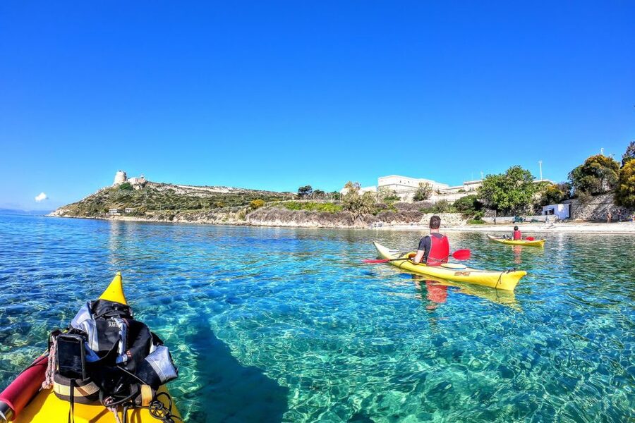 Cagliari: Exclusive small group Kayak tour at Devil"s Saddle - Kayaking Around Clear Water: Caves, Cliffs, and Wildlife Stops