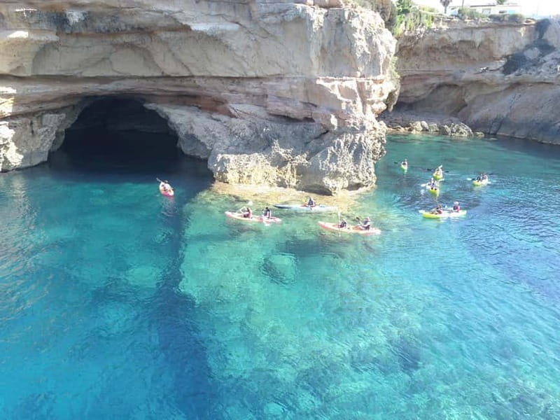 Cala Codolar: Guided Sea Kayaking and Snorkeling Tour - The kayak route: cliffs, caves, and secret coves on Ibiza’s west coast