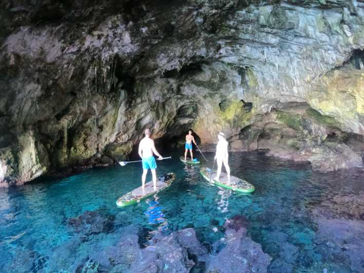 Cala Ratjada: SUP SAFARI TOUR 2H - Starting on the Beach by the Shop: gear-up and first paddle strokes