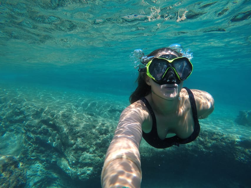 Cape Kamenjak: Kayak Tour with Cave Experience - Cliff jumping on the south shore: fun, but be smart