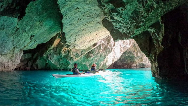 Capri: Caves and Beaches Kayaking Tour with GoPro Photos - Passing Through One of the Green Caves (3 Light-Filled Stops)