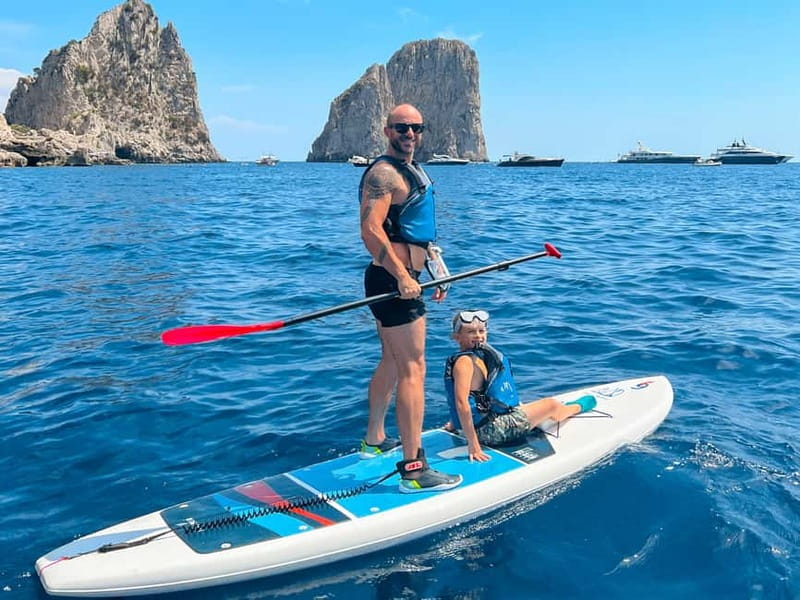 Capri: Caves and Beaches Paddle Board Tour with Photos - Faraglioni Di Capri Photo Stop: The Classic Backdrop, Now With Real Action