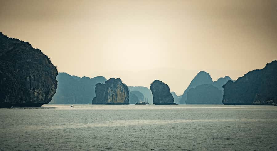 Cat Ba: Lan Ha and Ha Long Bay Boat Tour with Kayaking, Cave - Kayaking through narrow passages and cave areas