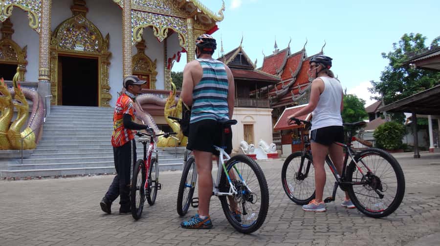 Chiang Mai: 25km Leisure Mountain Biking & Jungle Kayaking - Rice fields, village trails, and Wat Thepnimit Nantharam’s snack break