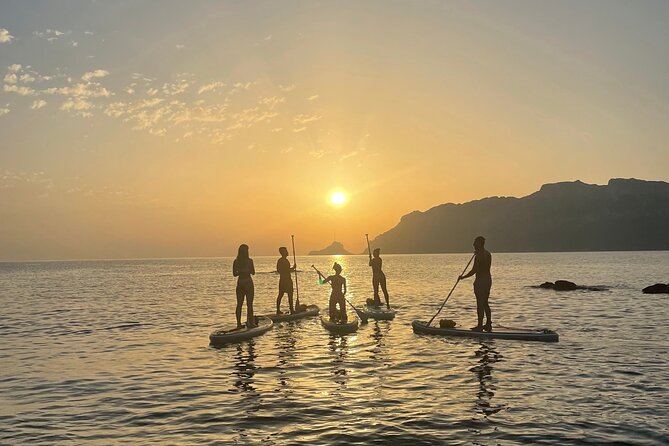 Dolphin-spotting SUP tour with Golfo Aranci aperitif - On-water stops: swims, relaxation, and the floating picnic vibe
