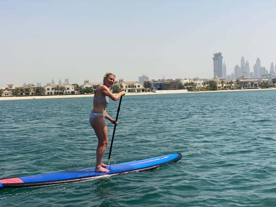 Dubai: Palm Jumeirah Paddle Boarding Tour - West Crescent views: Royal Atlantis, villas, marina, and big skyline hits