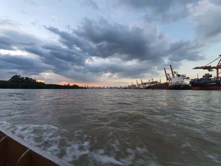 Explore Bangkok jungle by bike, kayak & boat - small group - Longtail boat around the harbor island: the city-scale contrast you came for