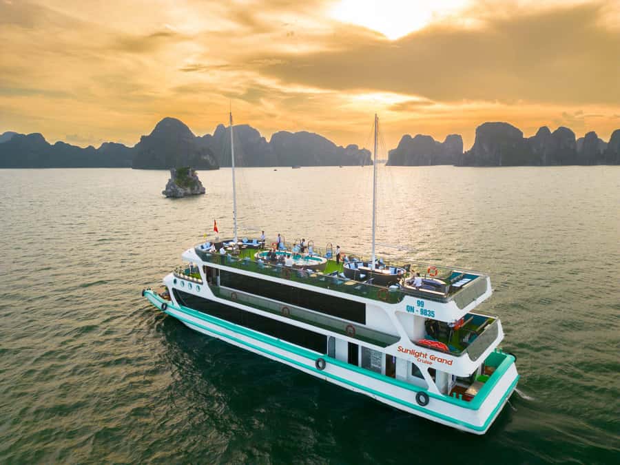 From Hanoi: Ha Long Bay Luxury Day Cruise with Food & Kayak - The Ha Long Bay cruise: iconic islands, clear photo moments