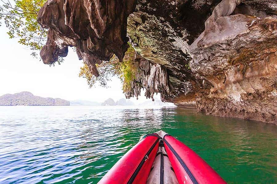 From Khao Lak: Premium James Bond Sunset and Canoe Adventure - Panak Island: cave passage and a Jurassic Park feeling