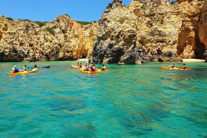 From Lagos: Kayak Tour of Ponta da Piedade Caves on Catamaran - Safety and timing: how the escort boat keeps the group together