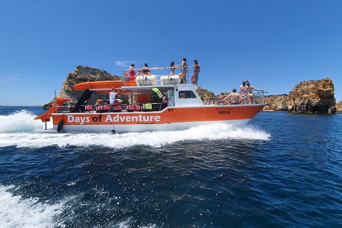From Lagos: Kayak Tour of Ponta da Piedade Caves on Catamaran - Swim break, slide, and the best way to handle your phone