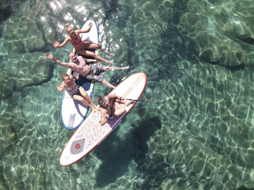 From Ornos: Mykonos Delos Catamaran Cruise with Meal & SUP - Back to Mykonos: Windmills, Sun, and a Wind-Down Sail