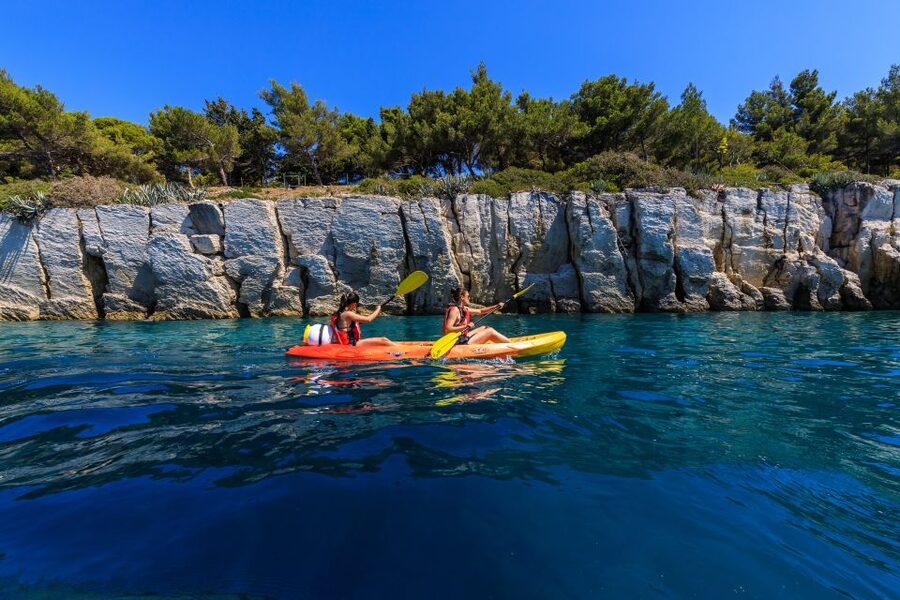 From Split: Sea Kayaking Tour - Kasjuni Beach break: swimming, snorkeling, photos, and a cliff jump (optional)