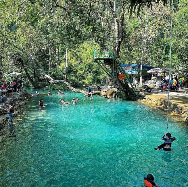 From Vientiane: Vang Vieng Tour with Cave Kayak & Zipline - Caves That Mix Atmosphere With Time to Explore