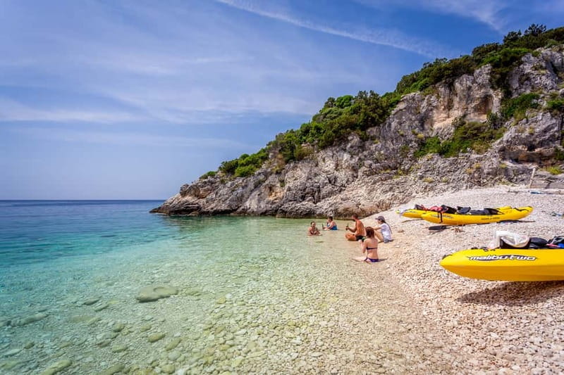 From Zadar: Full-Day kayak adventure in Dugi Otok - The day’s run-down: ferry, van rides, caves, cliffs, lunch, and beach time