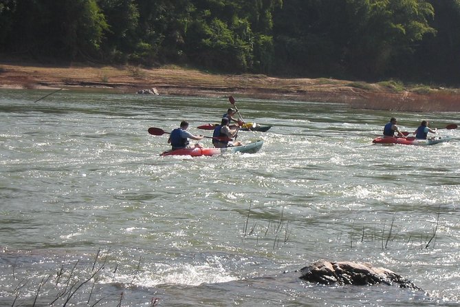 FULL DAY – Kuang Si Waterfall, Kayak on the Nam Ou / Mekong River, Pak Ou Caves - Manifa Elephant Camp: lunch with a Mekong-view reset