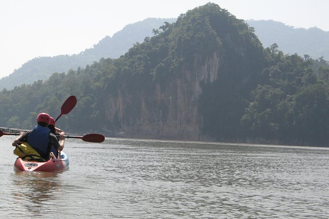 FULL DAY – Kuang Si Waterfall, Kayak on the Nam Ou / Mekong River, Pak Ou Caves - Kuang Si Falls: swimming, three tiers, trails, and the bear rescue center