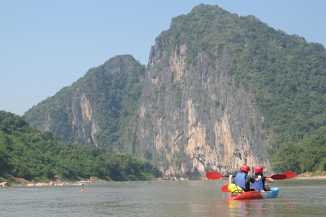 FULL DAY – Kuang Si Waterfall, Kayak on the Nam Ou / Mekong River, Pak Ou Caves - Pak Ou Caves: thousands of Buddhas and a focused guide stop