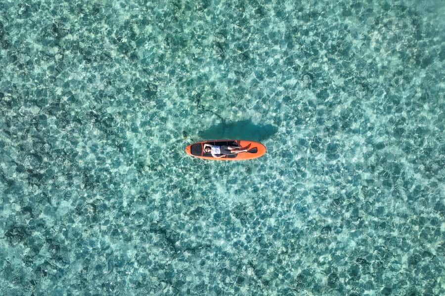 Gili Trawangan: Stand-Up Paddle with Drone Shot & Guide - Paddling at Sunrise: Mount Rinjani in the Background
