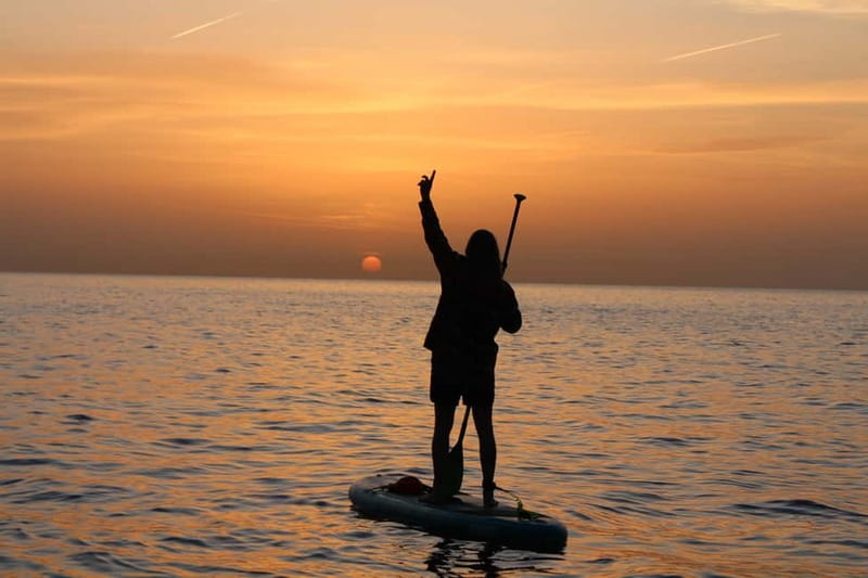 Golfo Aranci: Sup with dolphins, aperitif & photo shoot - First instruction at Spiaggia dei Baracconi: learning without stress