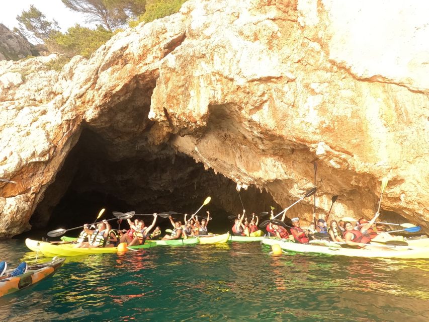 Granadella: Caló, Cova Llop Marí, and Ambolo Kayak Trip - The return to Granadella: snacks, drinks, and that last paddle