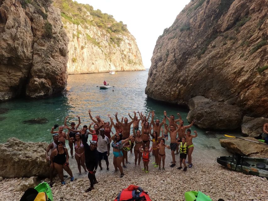 Granadella: Caló, Cova Llop Marí, and Ambolo Kayak Trip - Meeting La Terreta at Platja Granadella and getting set up fast
