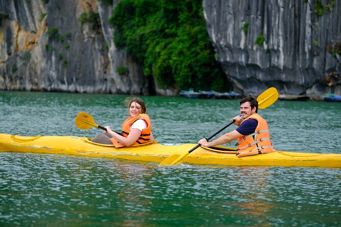 Ha Long Bay Cruise Day Tour-Cave, Kayaking,Ti top island & Lunch - Coach to Tuan Chau and lunch on the way to the Bay