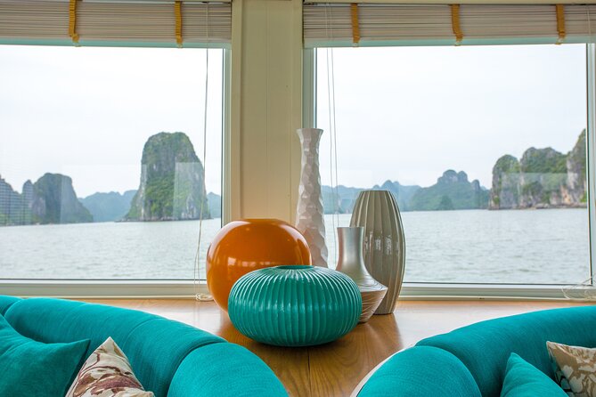 Ha Long Bay Day Tour with Lunch, Kayak, Cave explore - The cruise window before the caves: lunch and bay icons (12:30)