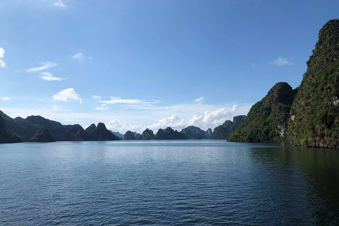 Half Day Explore Halong Bay With Lunch, Sung Sot Cave, Titop Island and Kayaking - Stop 4: Titop Island—swim, or climb for a panorama