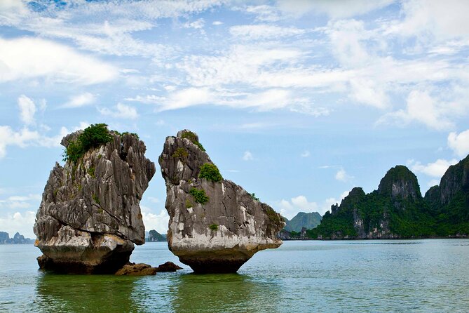 Halong Bay day cruise with Cave, Kayaking and Swimming on highway - Ti Top Island: Swim, Beach Time, or the 420-Step View