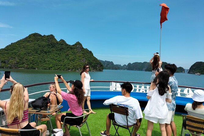 Halong Bay Day Tour With Titop Island, Cave, Kayak & Lunch - Titop Island: 400 steps for the view, or swim time for the break