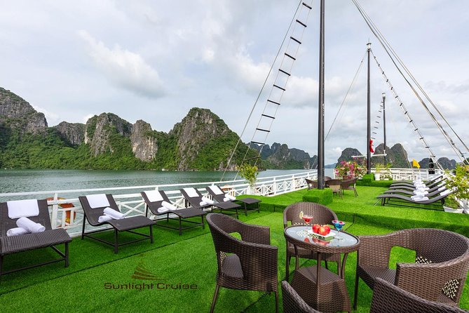 Halong bay deluxe cruise 2 days/ 1 night: kayaking, titop island, surprise cave - Day 2 Starts Early: Sunrise, Breakfast in a Quiet Bay, and Titop Island