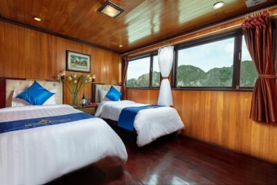 Halong bay Deluxe Cruise 2D/1N: Kayaking, swimming, Titop island & surprise cave - Day 1: Surprising Cave, Titop Island swim, and sunset spring rolls
