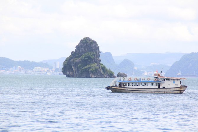Halong bay Full Day Cruise trip: kayaking, surprise cave, titop island, lunch - Getting on the Boat: The Part That Makes the Day Trip Feel Worth It